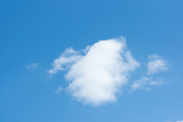 blue sky with light white clouds