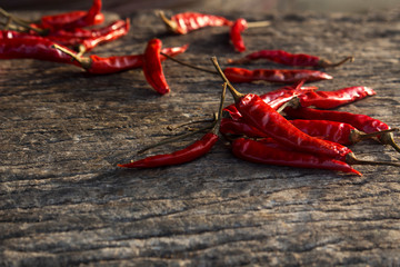 Red dried chillies on the old wood floor