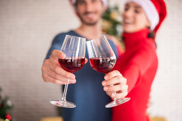 Attractive Caucasian couple of love are  celebrating Christmas in home