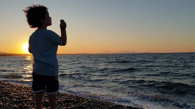 Young boy on the beach of Kos