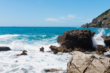 Beautiful azure sea and the rocky beach