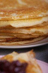 Breakfast with pancakes on a textured background