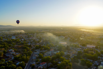 Hot air ballon  in light-blue sky over the pyramids of Teotihuacan Sun and Moon in Mexico.  Aerial view 