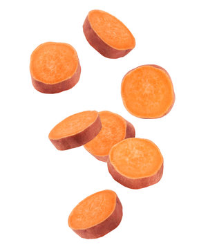 Falling sweet potato, slice, isolated on white background, clipping path, full depth of field
