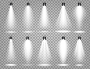 Vector spotlight set. Bright light beam. Transparent realistic effect. Stage lighting. Illuminated studio spotlights.