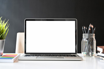 Fototapeta premium Mockup laptop computer on creativity workspace.