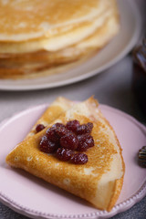 Breakfast with pancakes on a textured background