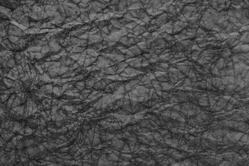 The texture of crumpled paper.