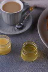 Breakfast with pancakes on a textured background