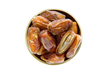 Fototapeta na wymiar Fresh and delicious dried dates palm fruits in wooden bowl isolated on white background.Top view.
