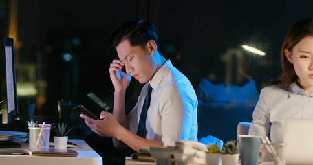 asian businessman feel eye pain