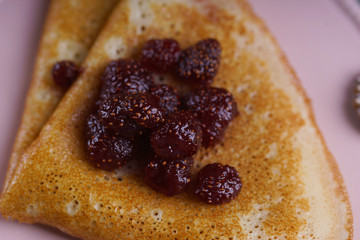 Breakfast with pancakes on a textured background