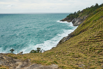 Fototapeta na wymiar coast of sea,cliff landscape,Laem Kra-ting phuket, in raining season