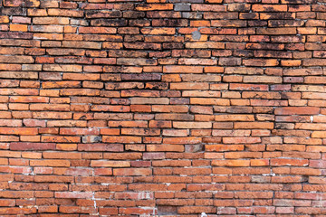 brick walls background and texture. The texture of the brick is orange. Background of empty brick basement wall.