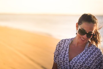 young man with sunglasses on the beach