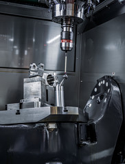 Quality control measurement probe. Metalworking CNC milling machine.