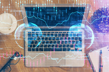 Multi exposure of chart and financial info and work space with computer background. Concept of international online trading.