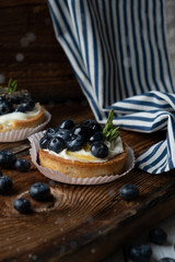 Tartlets with delicate cream and blueberries.