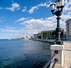 Fototapeta na wymiar Panorama of the Italian city of Bari, promenade, lights, observation wheel, spring. Traveling in Italy, tourism