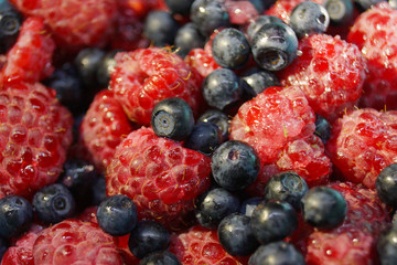 fresh raspberries and blueberries