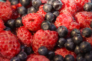raspberry and blueberry closeup photo