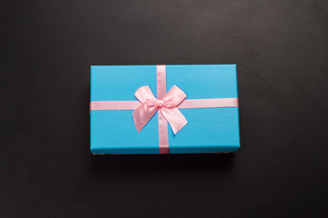 top view blue gift box on a black background
