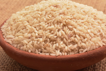 rice in mud bowl and pot