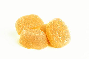 Isolated yellow marmalade on the white background.