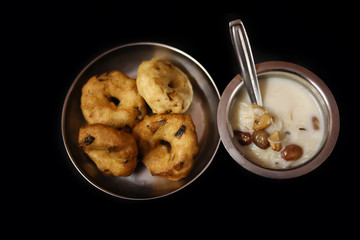 Semiya payasam (Mithai) Kerala,Sweet seviyan kheer or Payasam with vada a popular south Indian food on black background, Top view