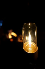Light a gas lantern in the camp
