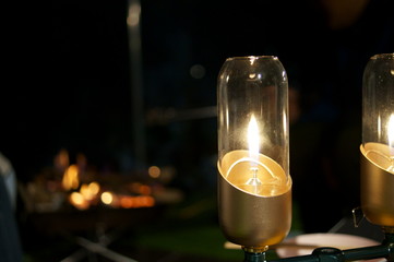 Light a gas lantern in the camp