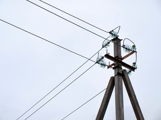 A power line and white sky.