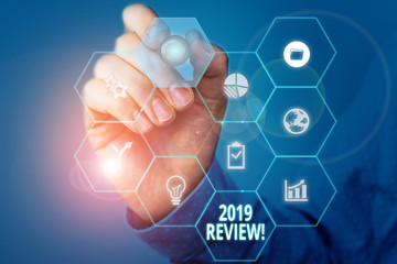Handwriting text 2019 Review. Conceptual photo remembering past year events main actions or good shows Picture photo system network scheme modern technology smart device