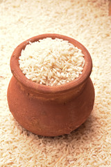 rice in mud bowl and pot