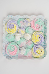 Obraz na płótnie Canvas Set of different meringues in a gift box.