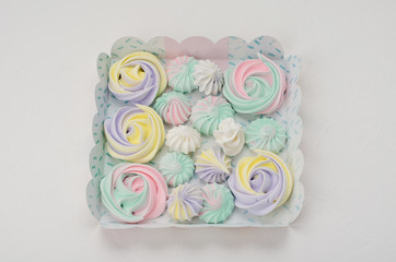 Set of different meringues in a gift box.