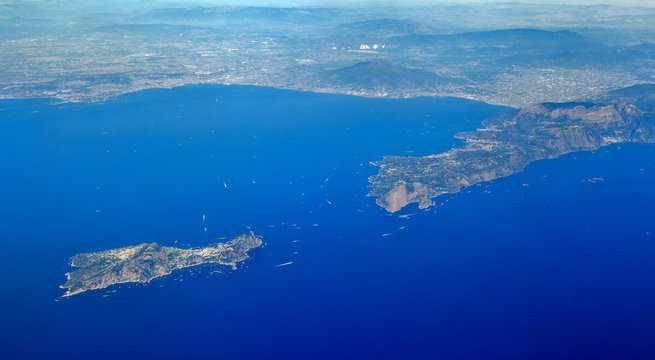 Aerial view of the Bay of Naples, with the island of Capri, the Sorrento Peninsula, and Mt Vesuvius