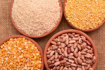indian rice, pulses and legumes in mud pot