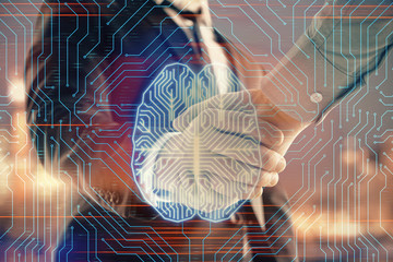Double exposure of human brain drawing on city view background with handshake. Concept of brainstorm