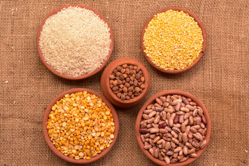 indian rice, pulses and legumes in mud pot