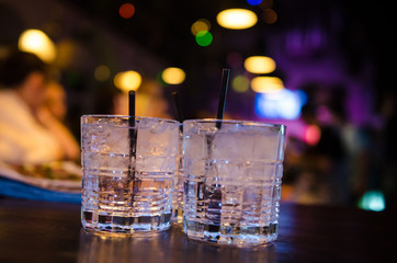 Glasses with gin and tonic in an old-fashioned glass