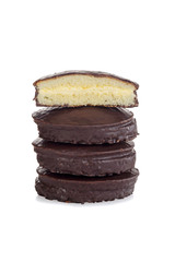 stack of chocolate custard cream filled sponge cakes