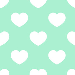 White hearts on a mint green background. Monochrome graphics, repeating pattern. Seamless vector illustration.  Neo-mint color trend.