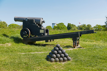 Old bronze cannon on rampart in city Fredericia, Denmark