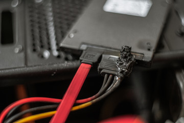 A charred, suffered a power surge burnt hard drive. suffered a power surge. black with soot. short...