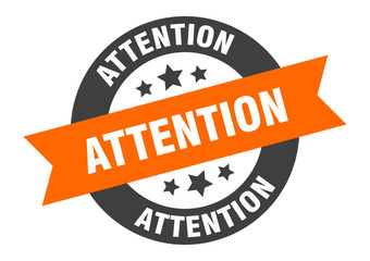 Fototapeta premium attention sign. attention orange-black round ribbon sticker