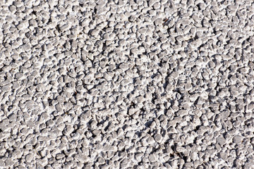 Light grey gravel Pebble floor texture, top view.