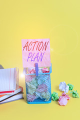 Text sign showing Action Plan. Business photo text detailed plan outlining actions needed to reach goals or vision Trash bin crumpled paper clothespin empty reminder office supplies yellow