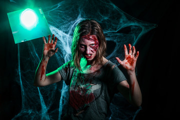 portrait of a scary bloody zombie girl. Horror. Halloween.