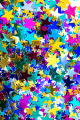 Fototapeta na wymiar Glitter Tinsel Stars Close Up For Background
